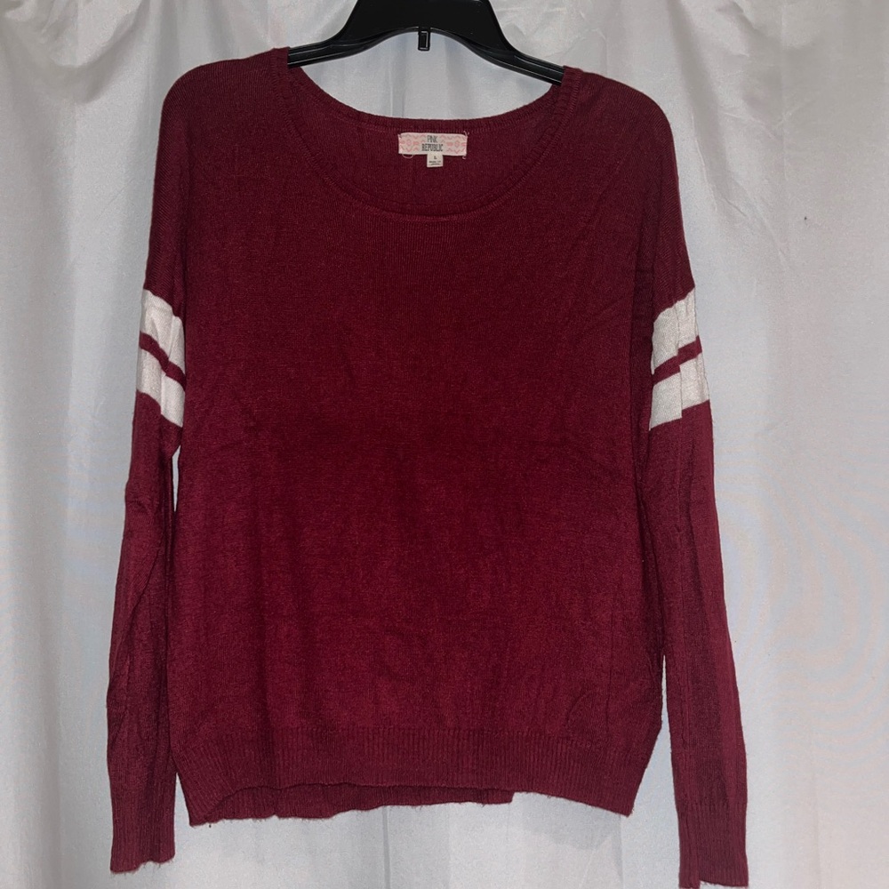 Red and white jersey sweater size medium/large